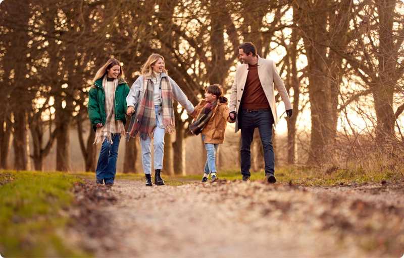 Family walking in the woods