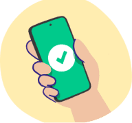 Hand holding a phone which shows a tick