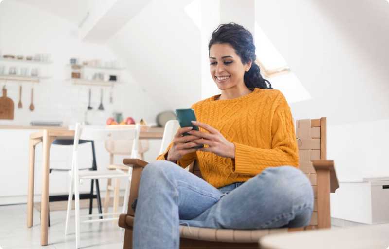 Woman sitting down on phone