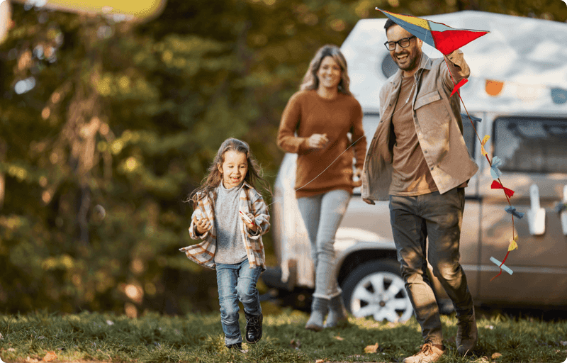 A family flying a kite